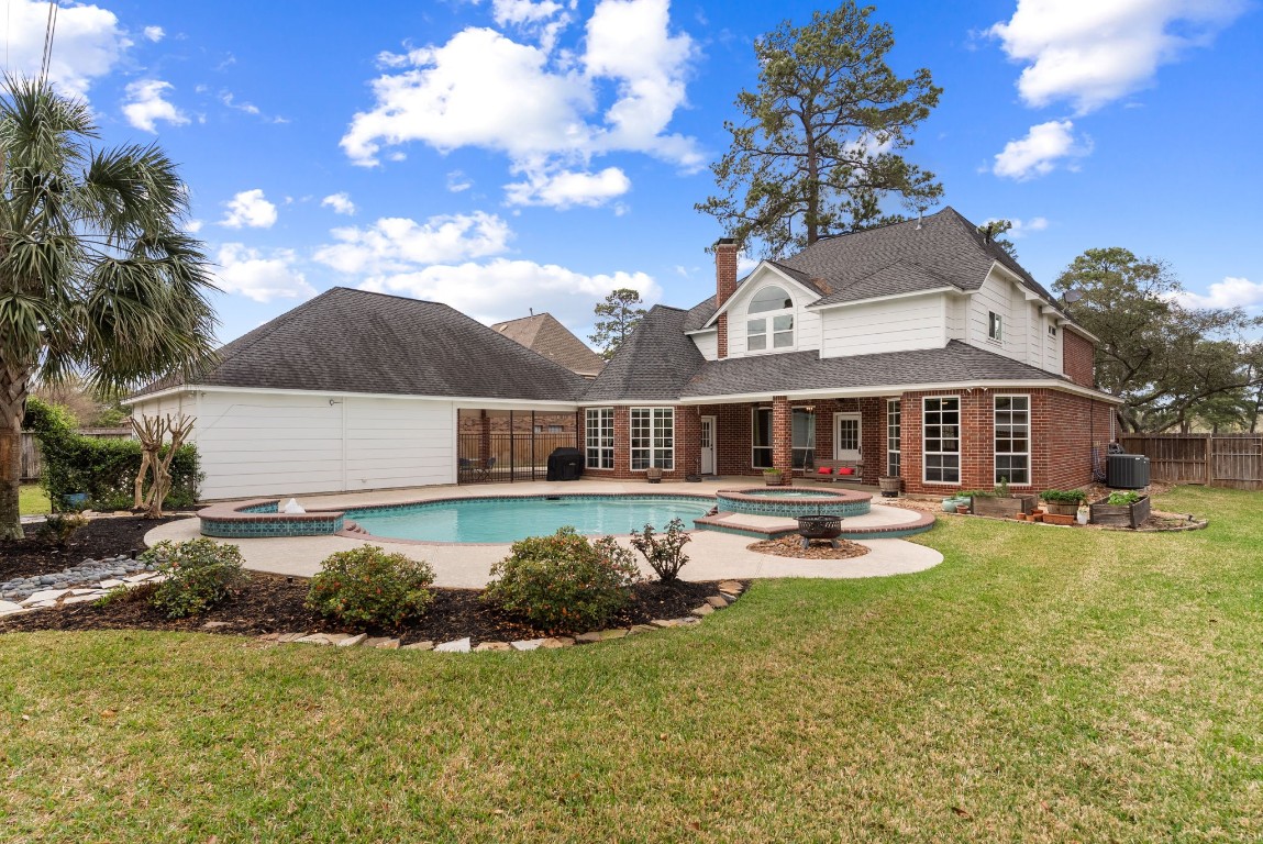 5503 Winding Ridge Drive Spring, TX 77379 - Photo 40 of 50 This backyard has two covered patio areas as the oversized porte cochere acts as a second covered area.