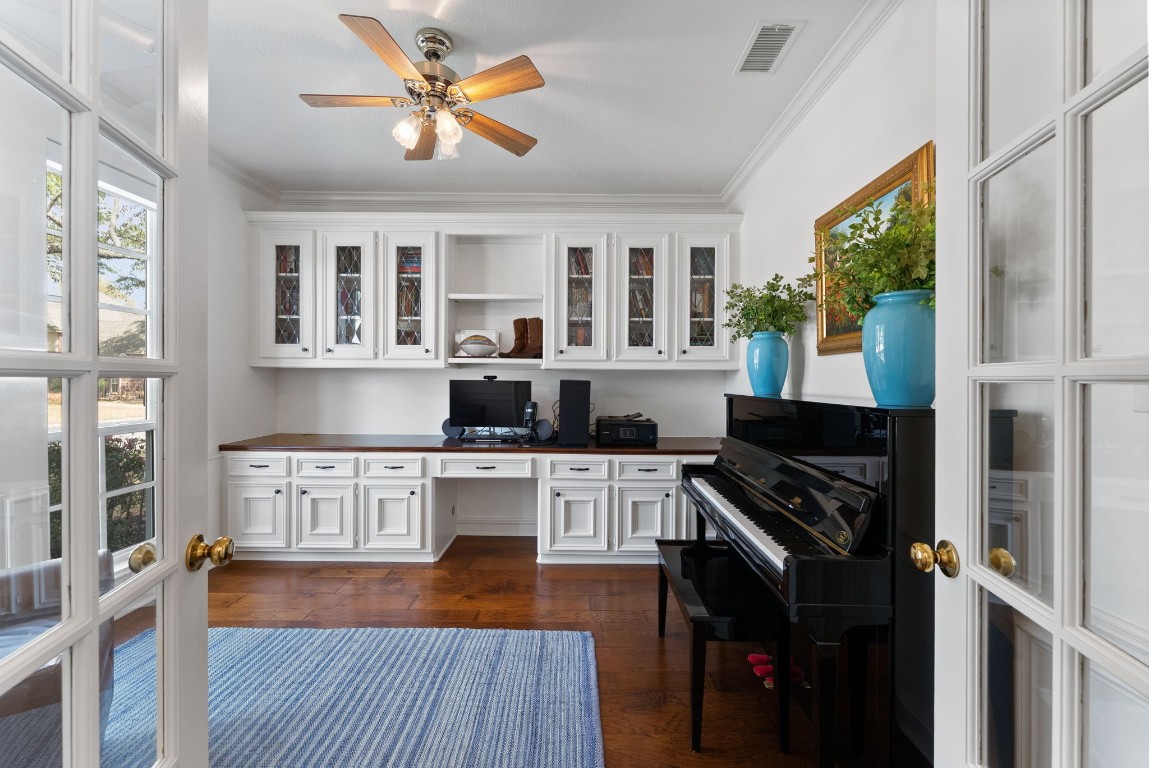 5503 Winding Ridge Drive Spring, TX 77379 - Photo 6 of 50 Glass French Doors lead to the large study with a wall of built-ins, crown molding, ceiling fan and front yard views.