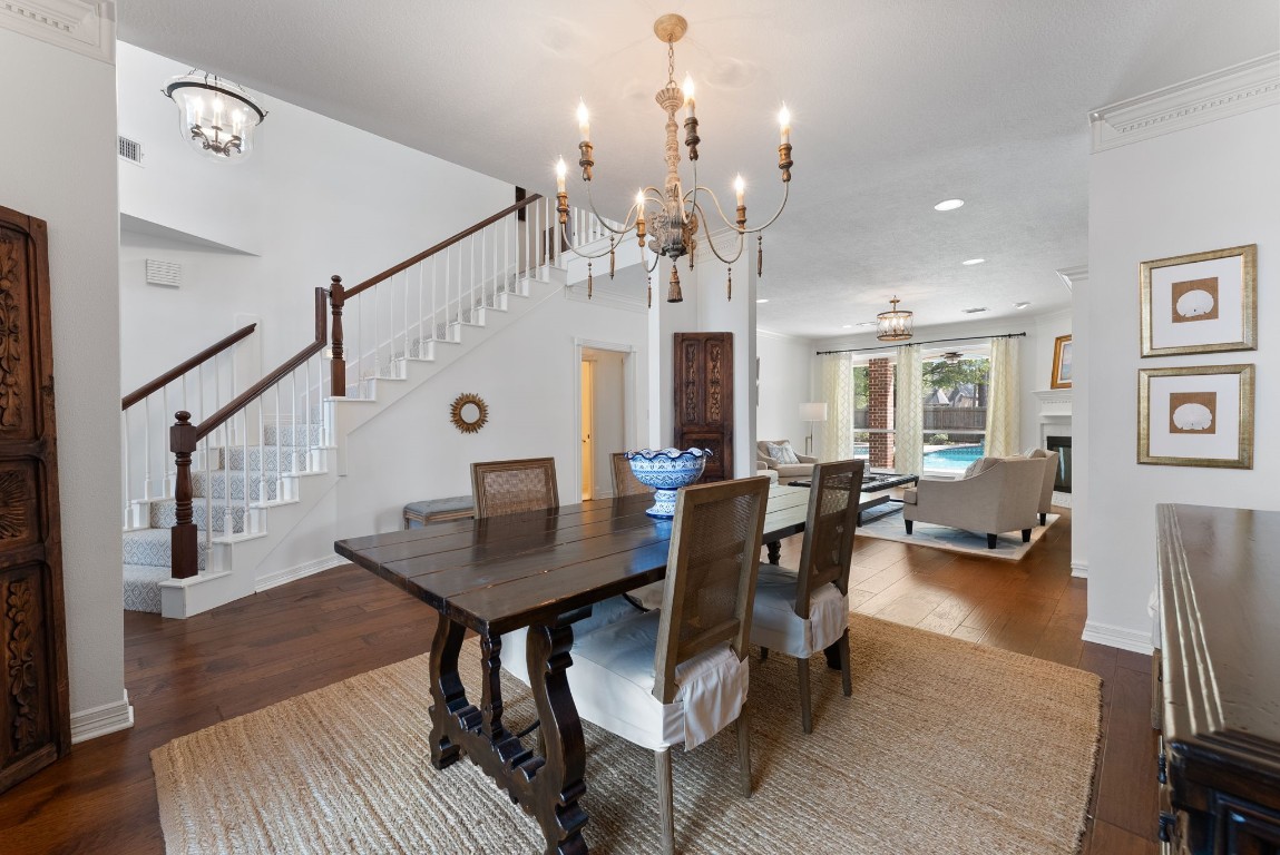 5503 Winding Ridge Drive Spring, TX 77379 - Photo 10 of 50 The formal dining room is just a step from the kitchen and opens nicely to one of the two living spaces on the main level.