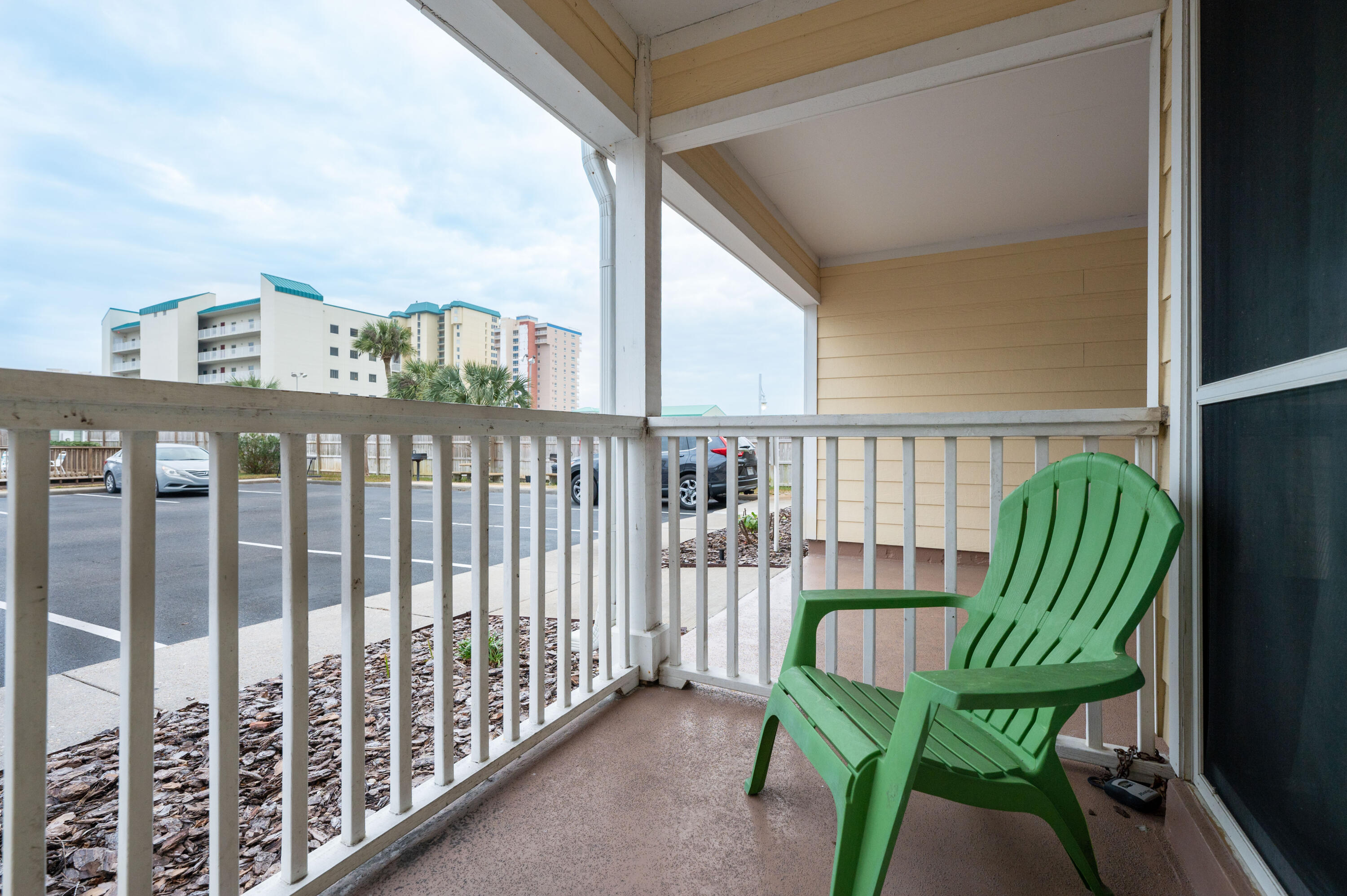 1006 E Highway, Unit 212 Destin, FL 32541 - Photo 26 of 52 a view of a chair and table in the balcony