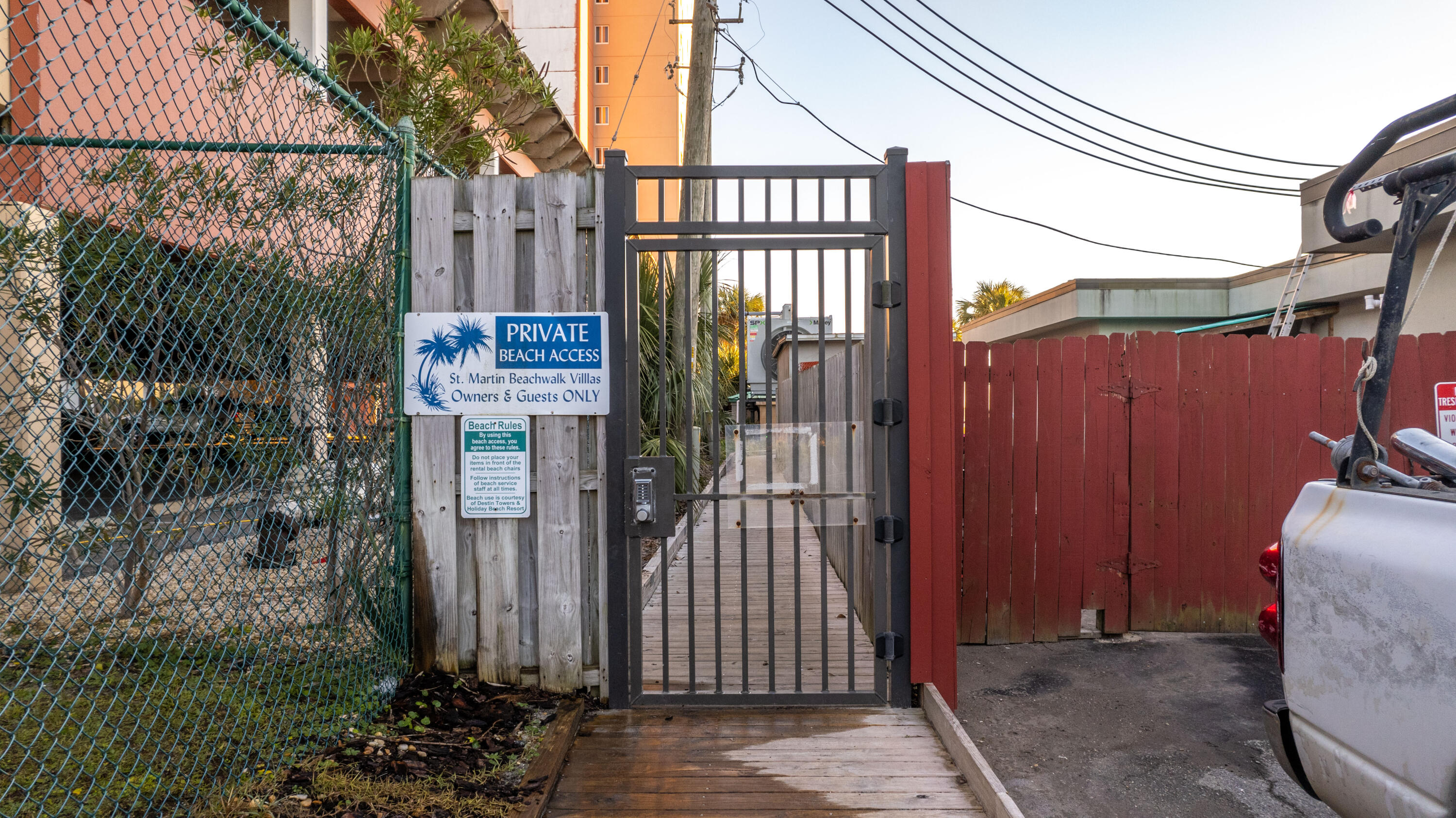 1006 E Highway, Unit 212 Destin, FL 32541 - Photo 40 of 52 a sign board with a small yard