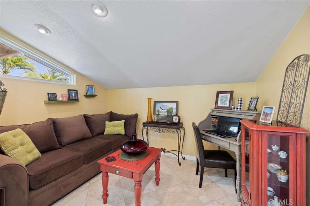 2065 Bronson Way Riverside, CA 92506 - Photo 19 of 75 a living room with furniture and a wooden floor