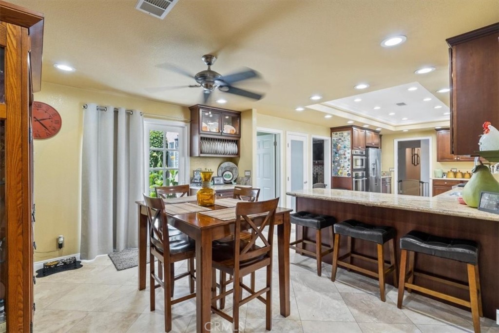 2065 Bronson Way Riverside, CA 92506 - Photo 20 of 75 a view of a dining room with furniture window and outside view