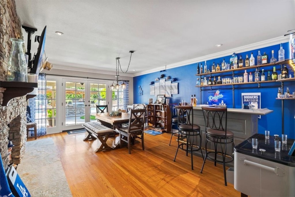 2065 Bronson Way Riverside, CA 92506 - Photo 32 of 75 a living room with lots of furniture and a book shelf