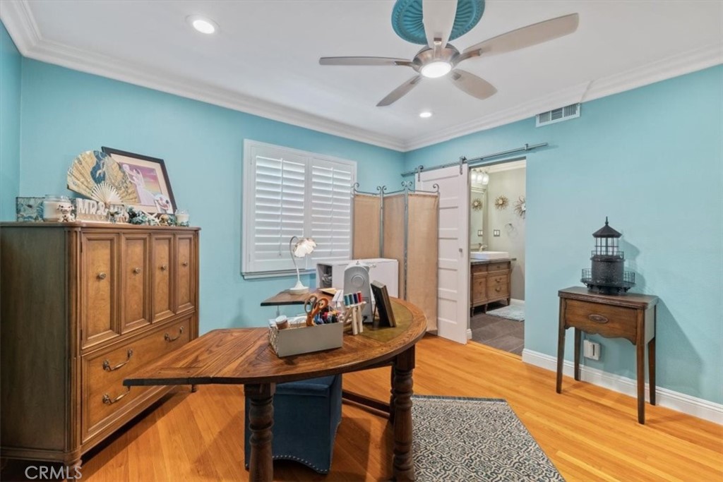2065 Bronson Way Riverside, CA 92506 - Photo 34 of 75 a view of a workspace with furniture and a window