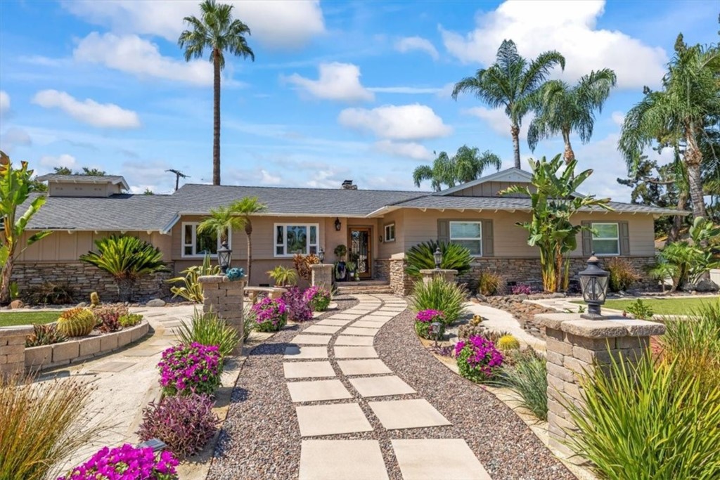 2065 Bronson Way Riverside, CA 92506 - Photo 5 of 75 a view of a house with swimming pool and sitting area