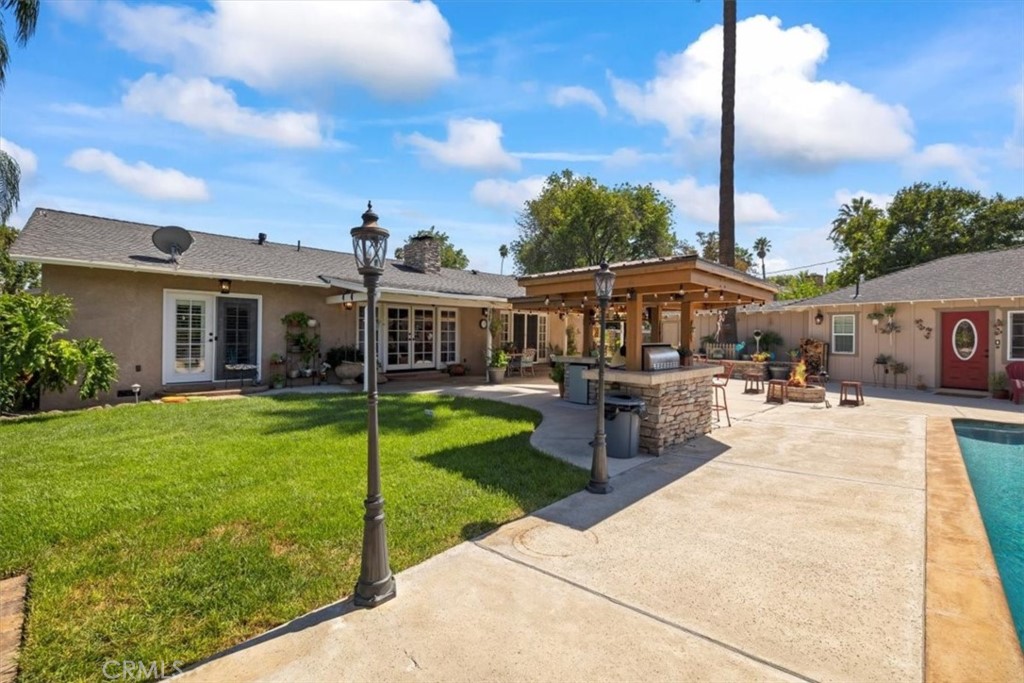 2065 Bronson Way Riverside, CA 92506 - Photo 56 of 75 a view of a house with a yard
