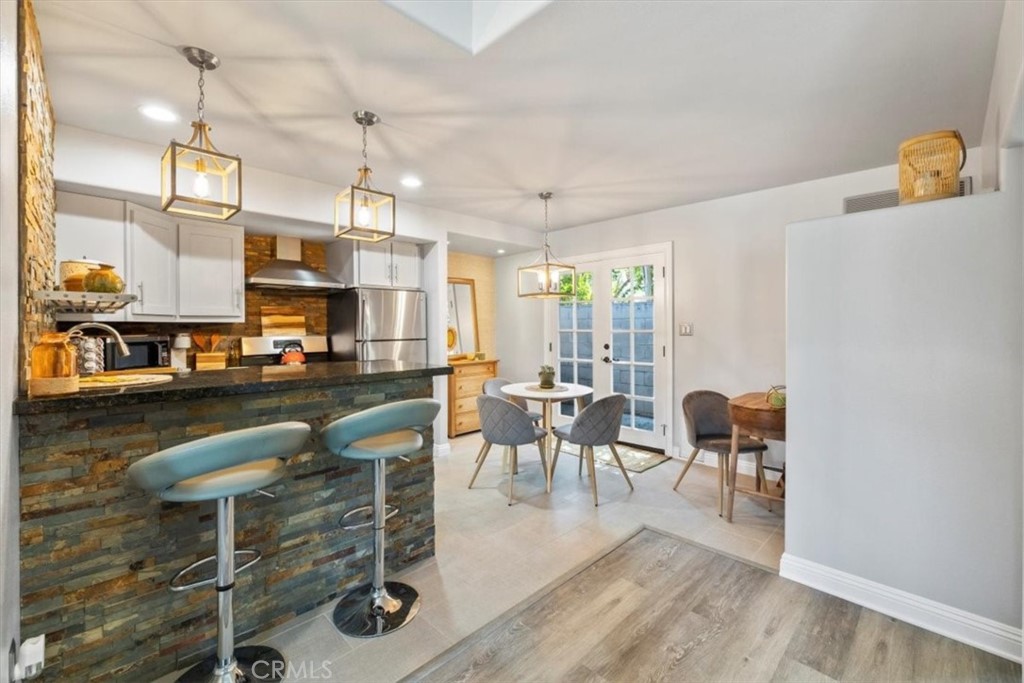 2065 Bronson Way Riverside, CA 92506 - Photo 63 of 75 a view of a dining room with furniture window and outside view