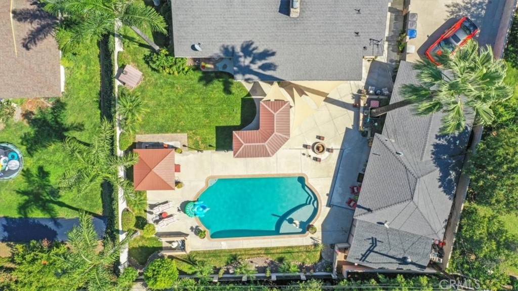 2065 Bronson Way Riverside, CA 92506 - Photo 75 of 75 an aerial view of a house with a yard and garden