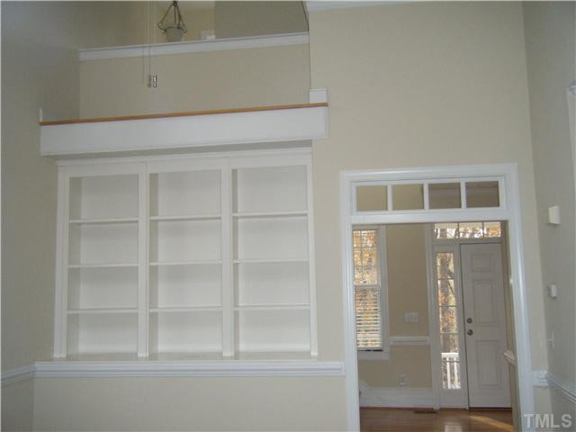 117 A Pierce Road Garner, NC 27529 - Photo 11 of 24 2 Story Living Room w/built-in bookshelves Living Room