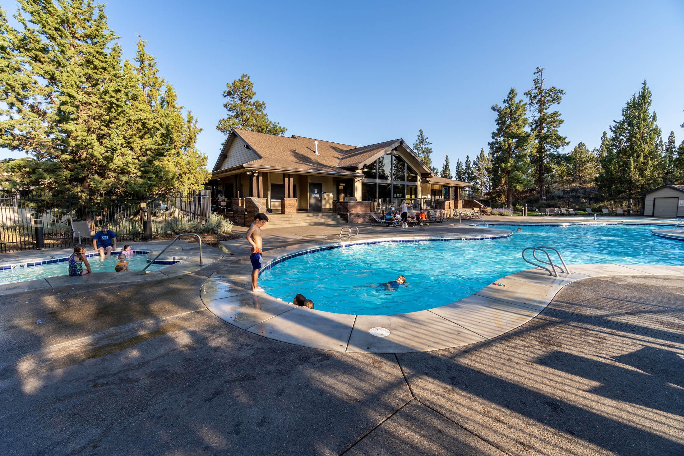 61129 Manhae Loop Bend, OR 97702 - Photo 39 of 44 Community photo, shared amenities. Pool area view to club house.