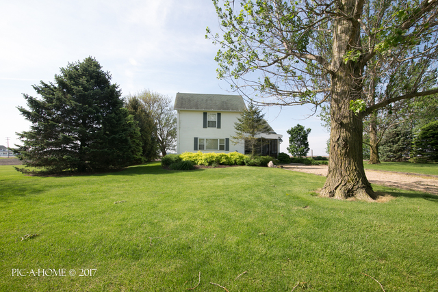 15063 Shabbona Road Malta, IL 60150 - Photo 2 of 25 a house view with a garden space