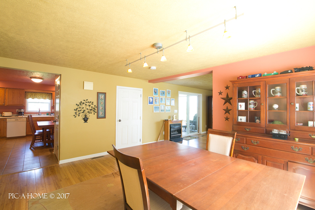 15063 Shabbona Road Malta, IL 60150 - Photo 14 of 25 a view of a living room and dining room