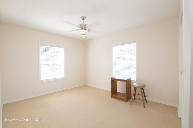 15063 Shabbona Road Malta, IL 60150 - Photo 16 of 25 a view of an empty room with a window