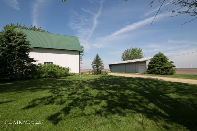 15063 Shabbona Road Malta, IL 60150 - Photo 21 of 25 a view of a house with a yard