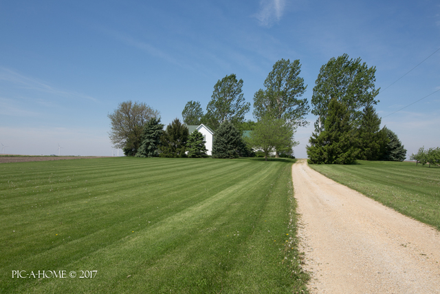 15063 Shabbona Road Malta, IL 60150 - Photo 24 of 25 a view of a golf course with a garden