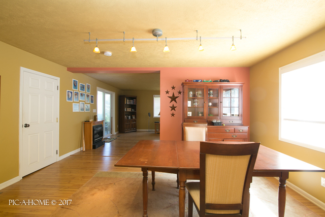 15063 Shabbona Road Malta, IL 60150 - Photo 5 of 25 a dining room with furniture and window