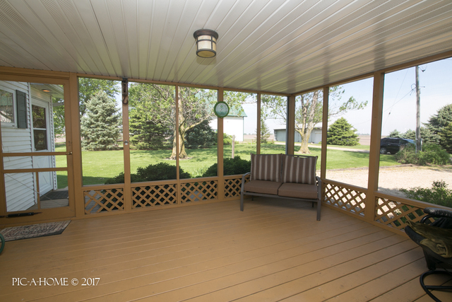 15063 Shabbona Road Malta, IL 60150 - Photo 10 of 25 a balcony with furniture and garden view