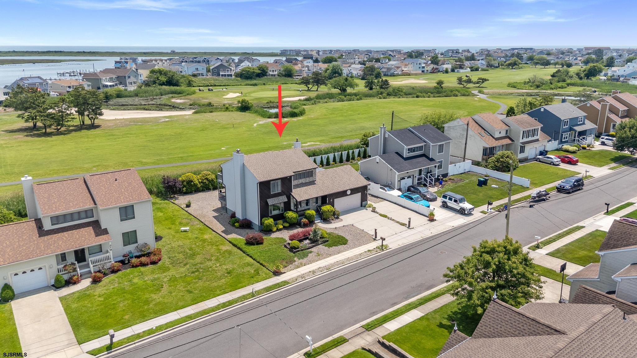 217 Hagen Road Brigantine, NJ 08203 - Photo 21 of 63 an aerial view of a house with garden space and ocean view