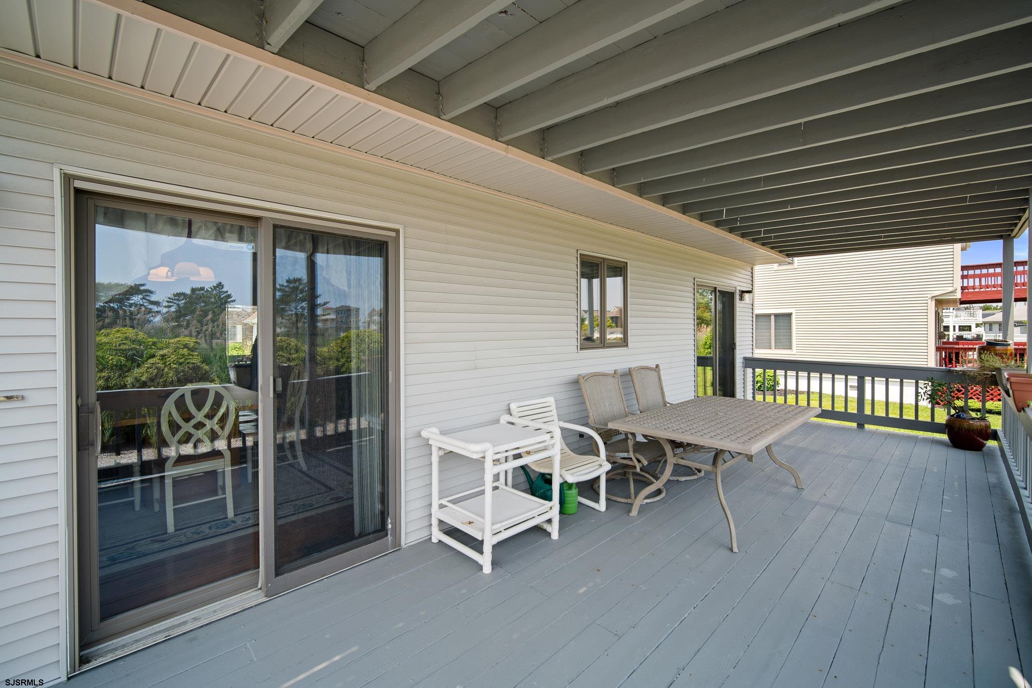 217 Hagen Road Brigantine, NJ 08203 - Photo 37 of 63 a outdoor space with chairs