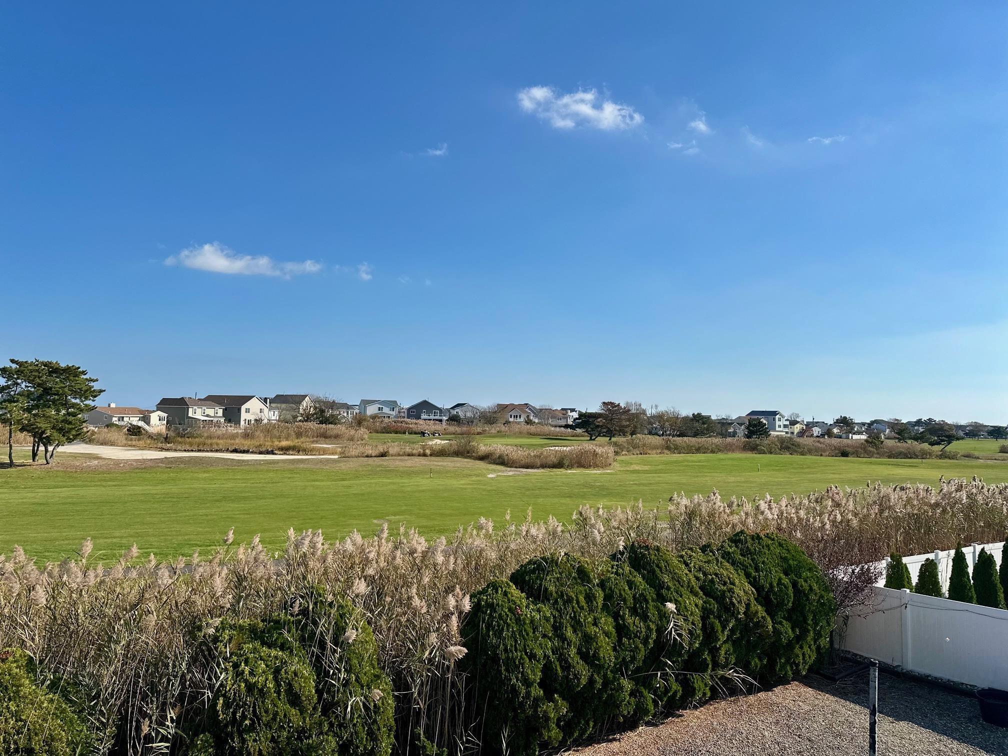 217 Hagen Road Brigantine, NJ 08203 - Photo 62 of 63 a view of a golf course with a ocean view