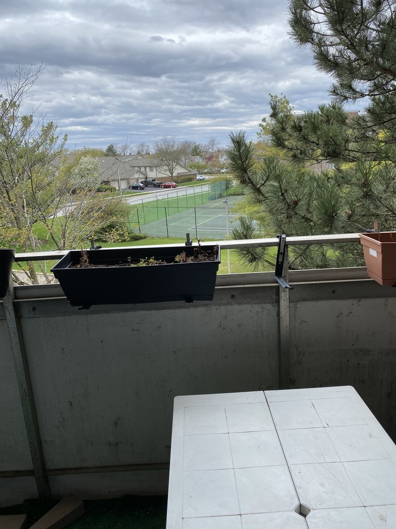 Undisclosed Address Schaumburg, IL 60193 - Photo 13 of 17 a view of outdoor space with seating