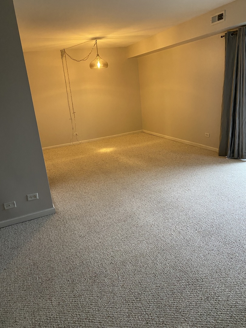 Undisclosed Address Schaumburg, IL 60193 - Photo 8 of 17 a view of a room with a shower