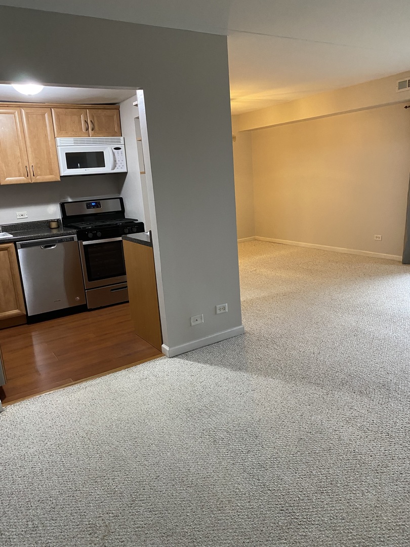 Undisclosed Address Schaumburg, IL 60193 - Photo 9 of 17 a view of kitchen and microwave