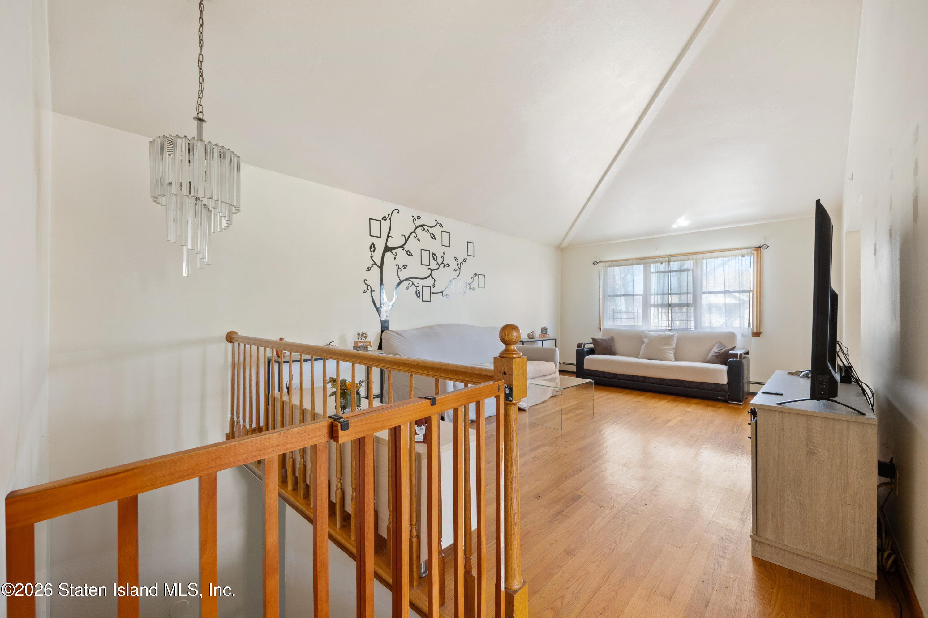62 Bennett Place Staten Island, NY 10312 - Photo 13 of 34 a view of a room with gym equipment