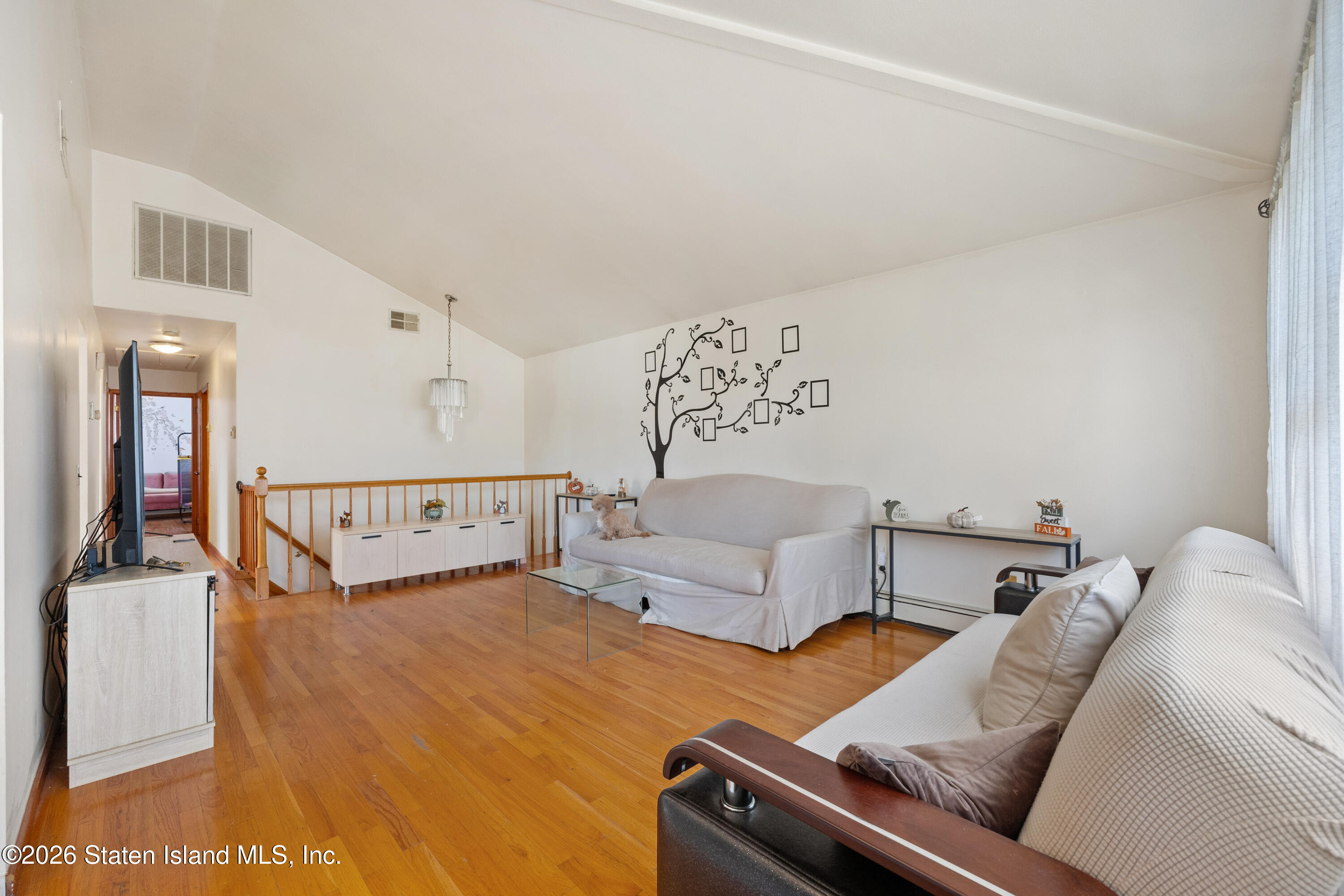 62 Bennett Place Staten Island, NY 10312 - Photo 14 of 34 a living room with furniture