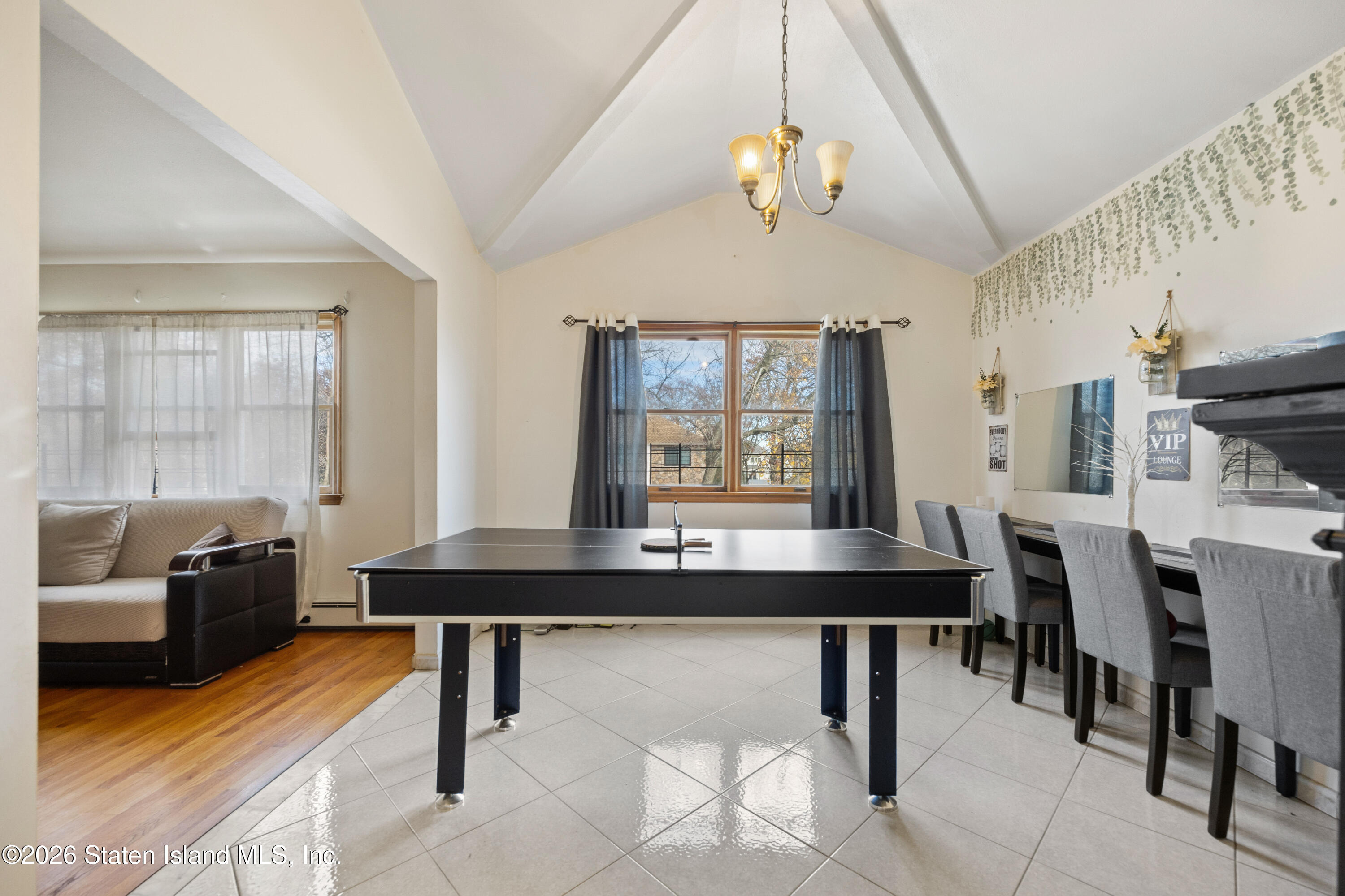 62 Bennett Place Staten Island, NY 10312 - Photo 16 of 34 a view of a dining room with furniture
