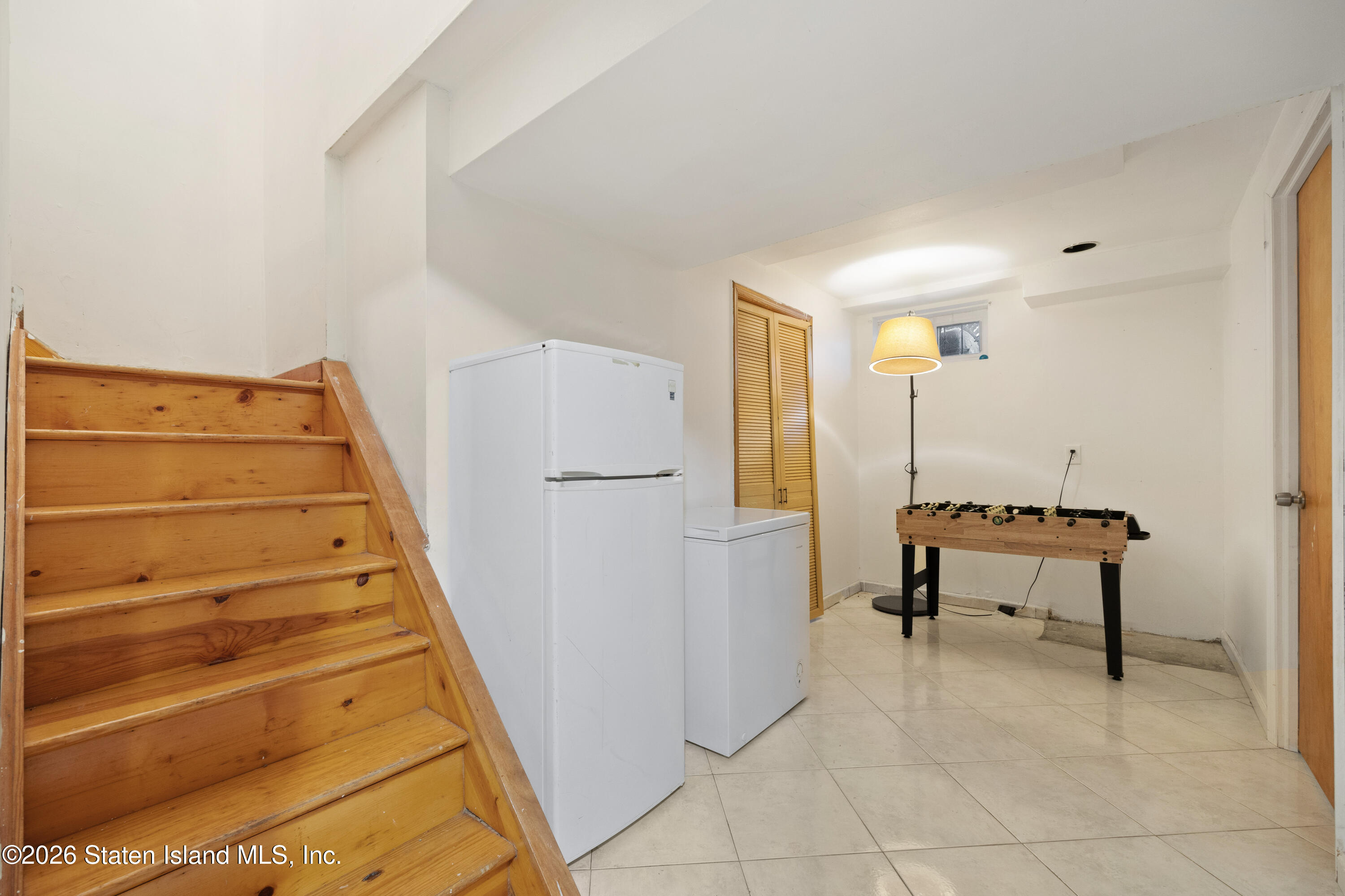 62 Bennett Place Staten Island, NY 10312 - Photo 24 of 34 a view of a livingroom with furniture