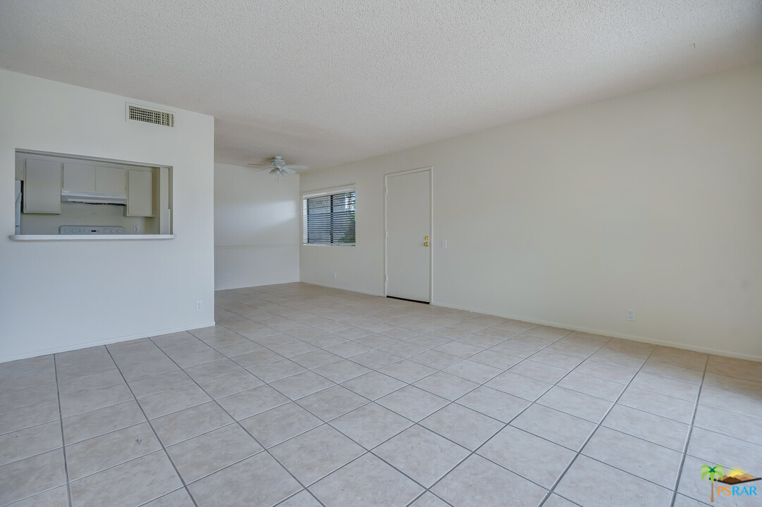 1111 East Ramon Road, Unit 69 Palm Springs, CA 92264 - Photo 6 of 20 a view of an empty room with a window