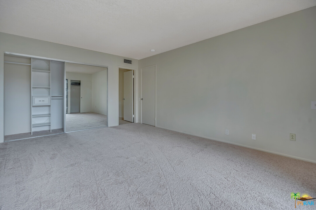 1111 East Ramon Road, Unit 69 Palm Springs, CA 92264 - Photo 7 of 20 a view of an empty room and a window