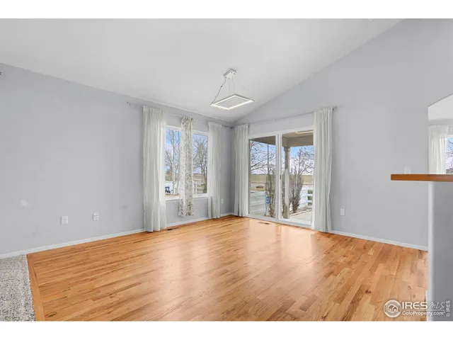 a kitchen with stainless steel appliances granite countertop a stove a sink dishwasher and a refrigerator