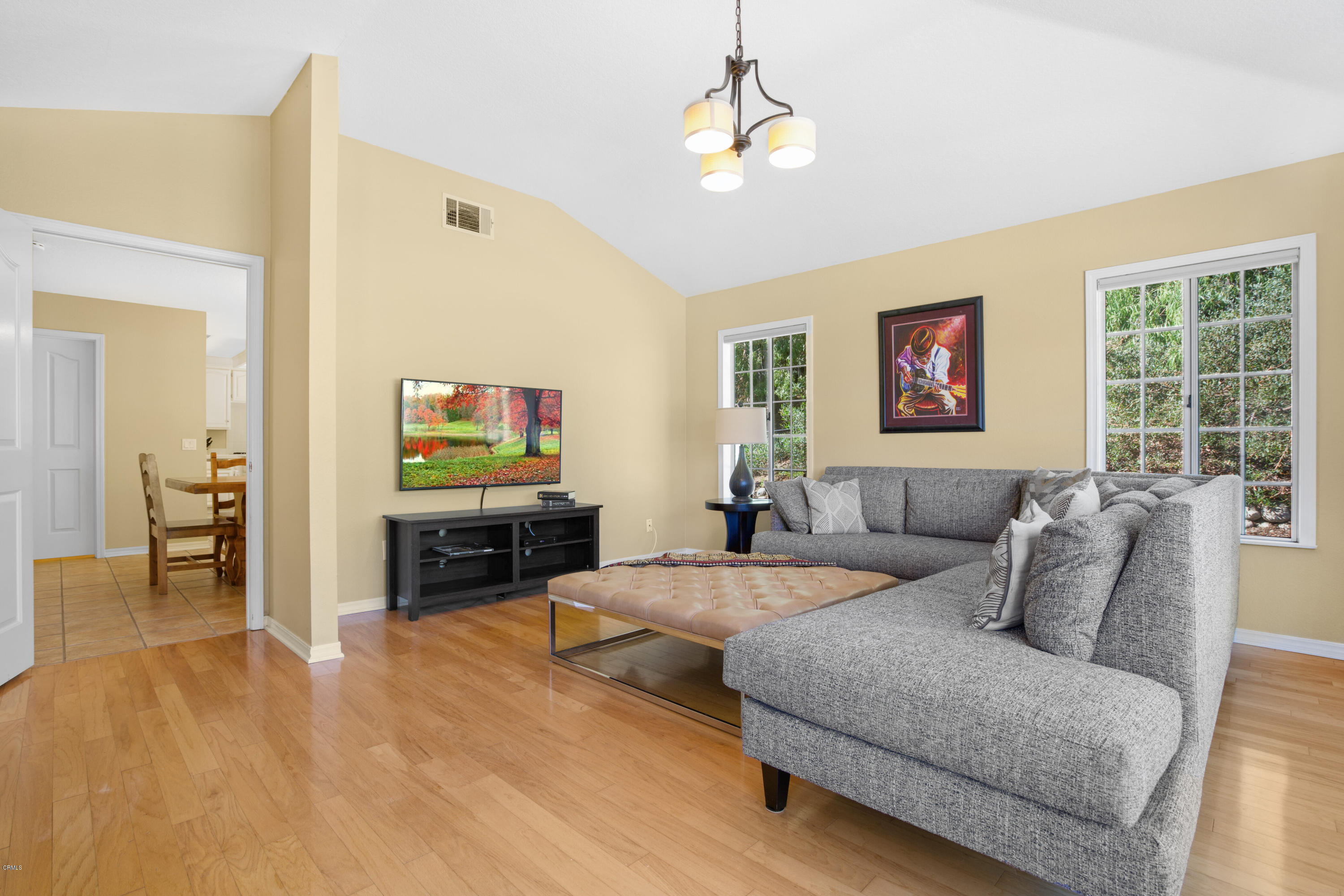 6670 Armitos Drive Camarillo, CA 93012 - Photo 16 of 35 a living room with furniture and a flat screen tv