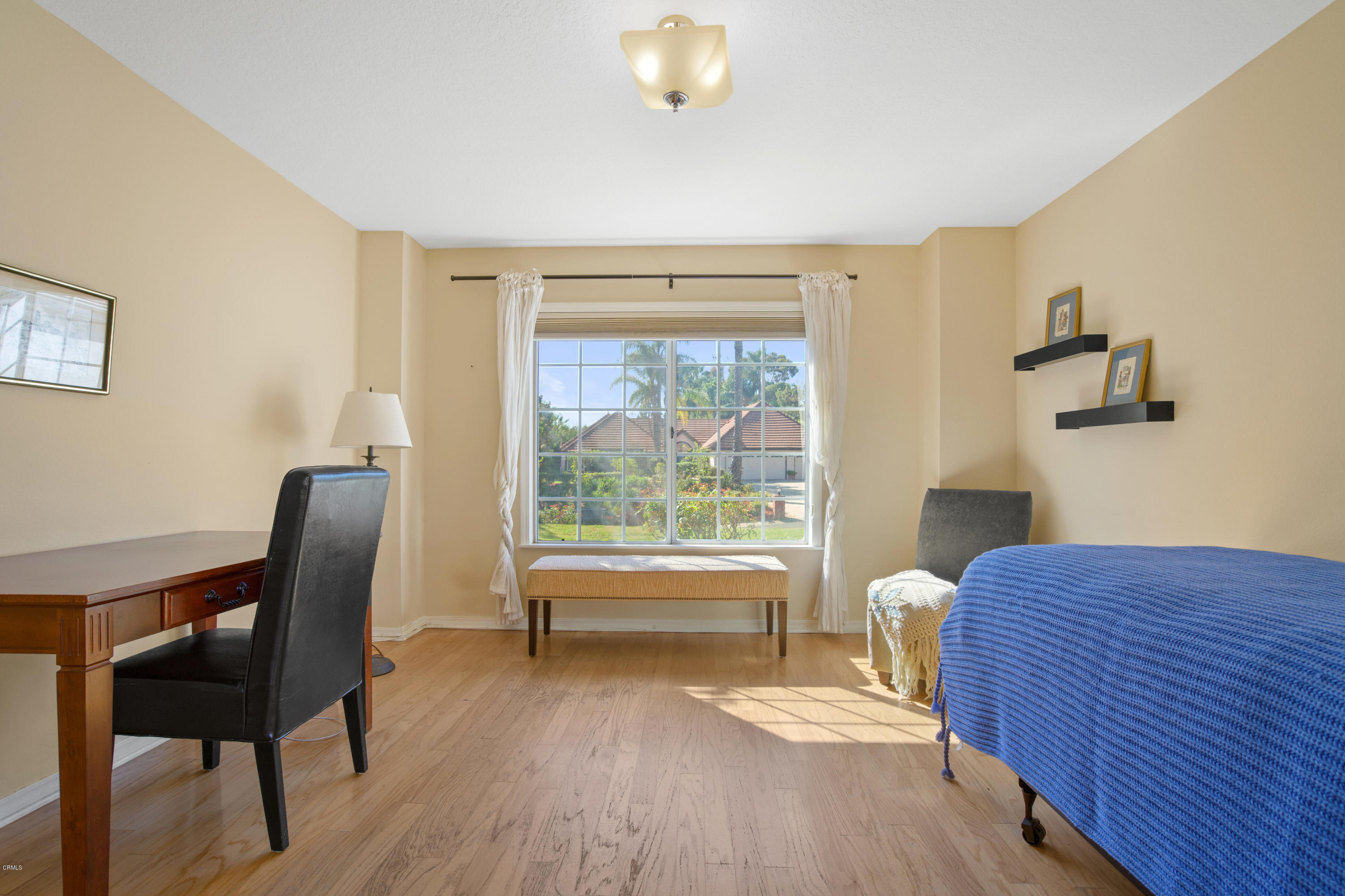 6670 Armitos Drive Camarillo, CA 93012 - Photo 24 of 35 a bedroom with furniture and a window