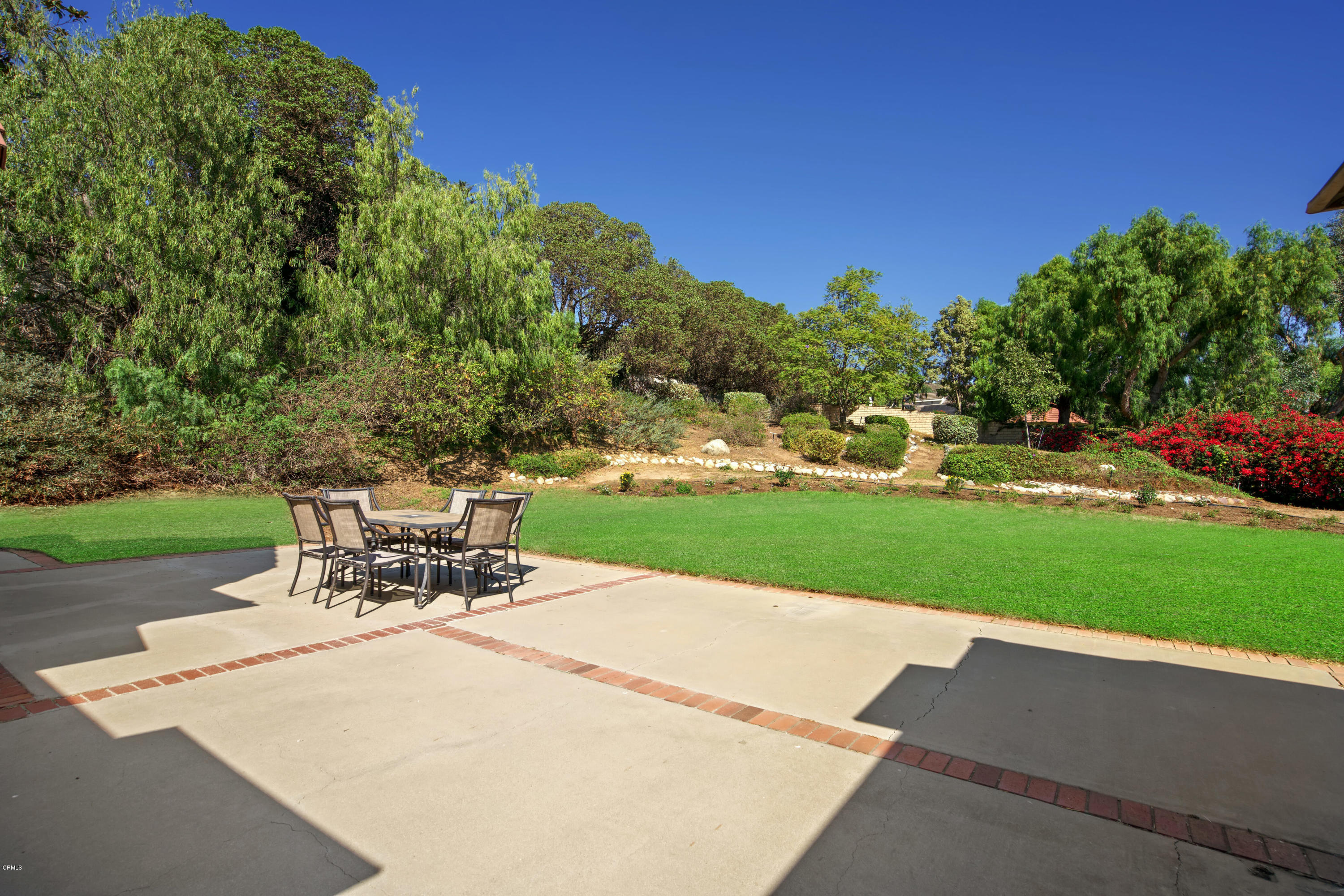 6670 Armitos Drive Camarillo, CA 93012 - Photo 30 of 35 a view of a table and chairs in the garden