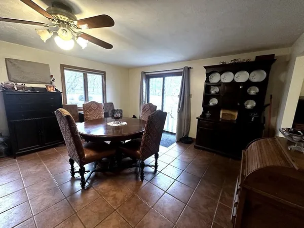 a view of a dining room with furniture