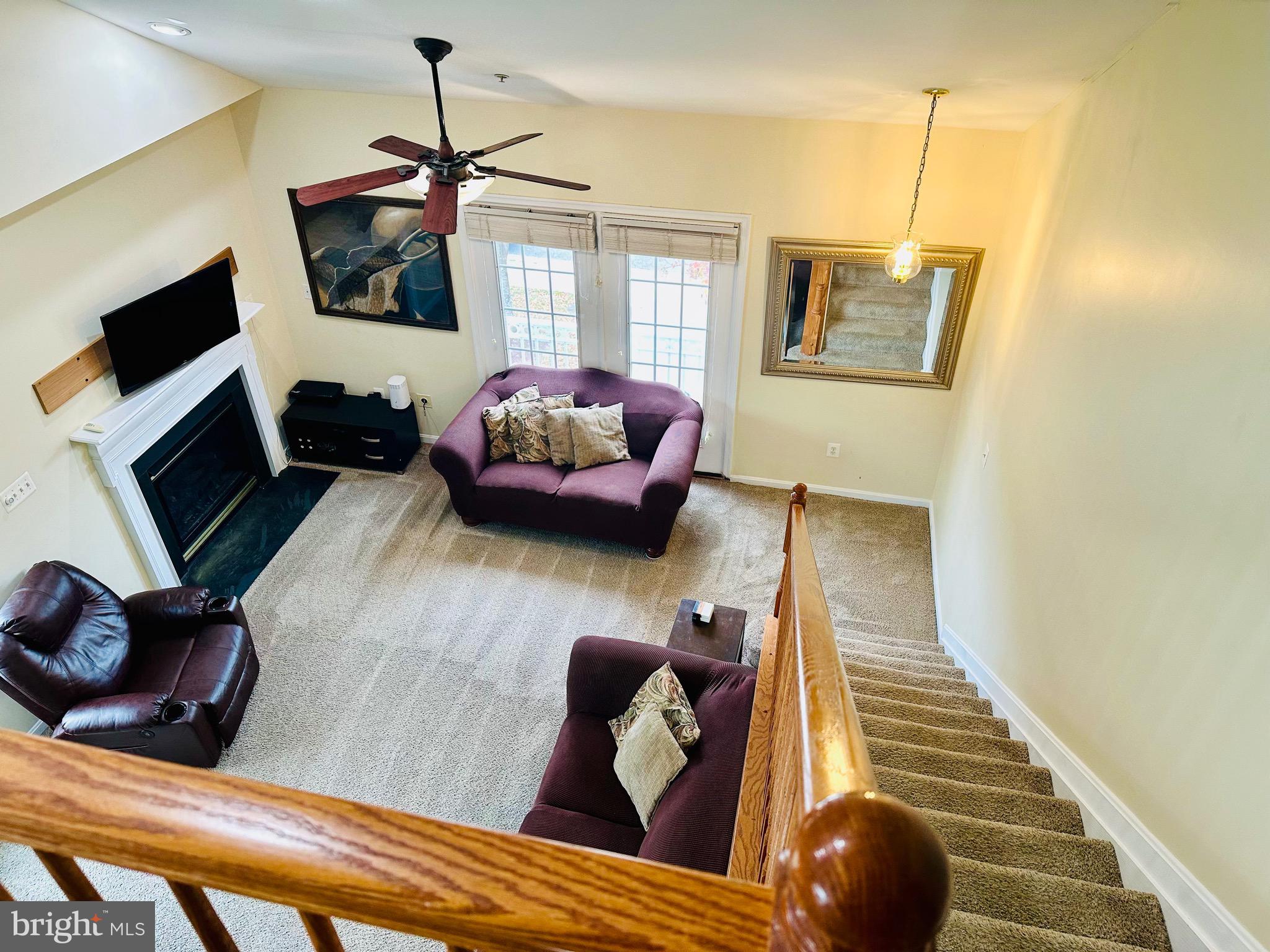 2013 Astilbe Way, Unit 2013 Odenton, MD 21113 - Photo 23 of 61 a bedroom with furniture and a flat screen tv