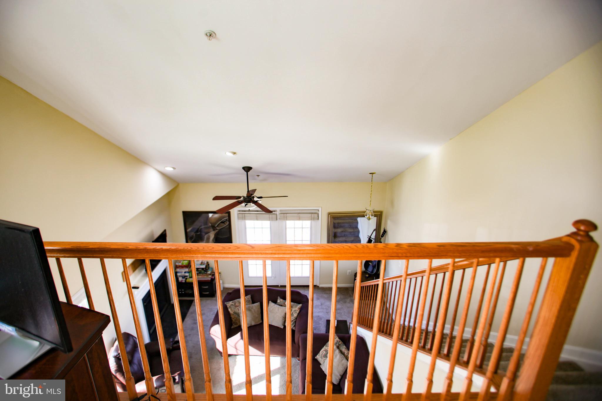 2013 Astilbe Way, Unit 2013 Odenton, MD 21113 - Photo 25 of 61 a view of a hallway with windows