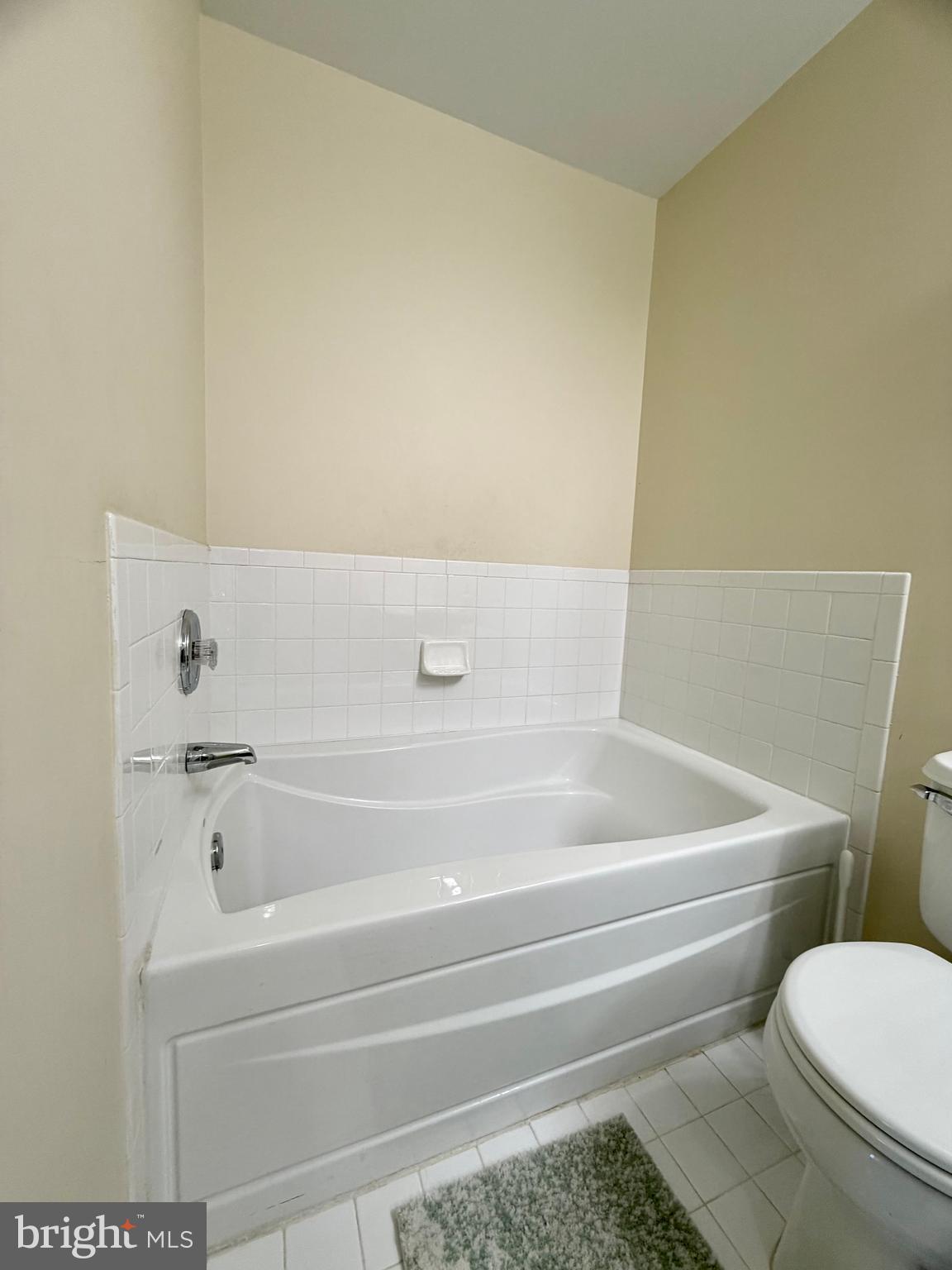 2013 Astilbe Way, Unit 2013 Odenton, MD 21113 - Photo 37 of 61 a bathroom with a toilet and bathtub