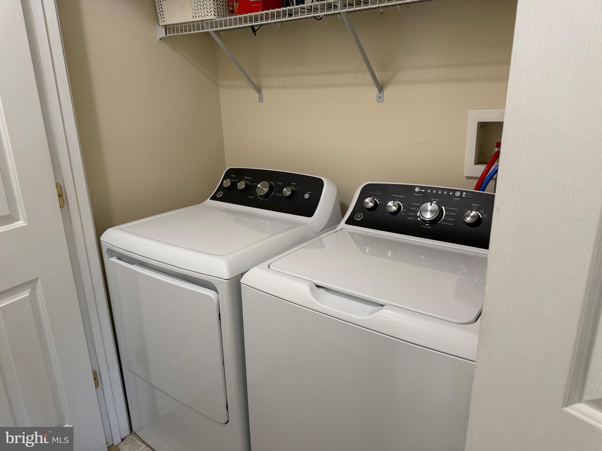 2013 Astilbe Way, Unit 2013 Odenton, MD 21113 - Photo 39 of 61 a utility room with dryer and washer