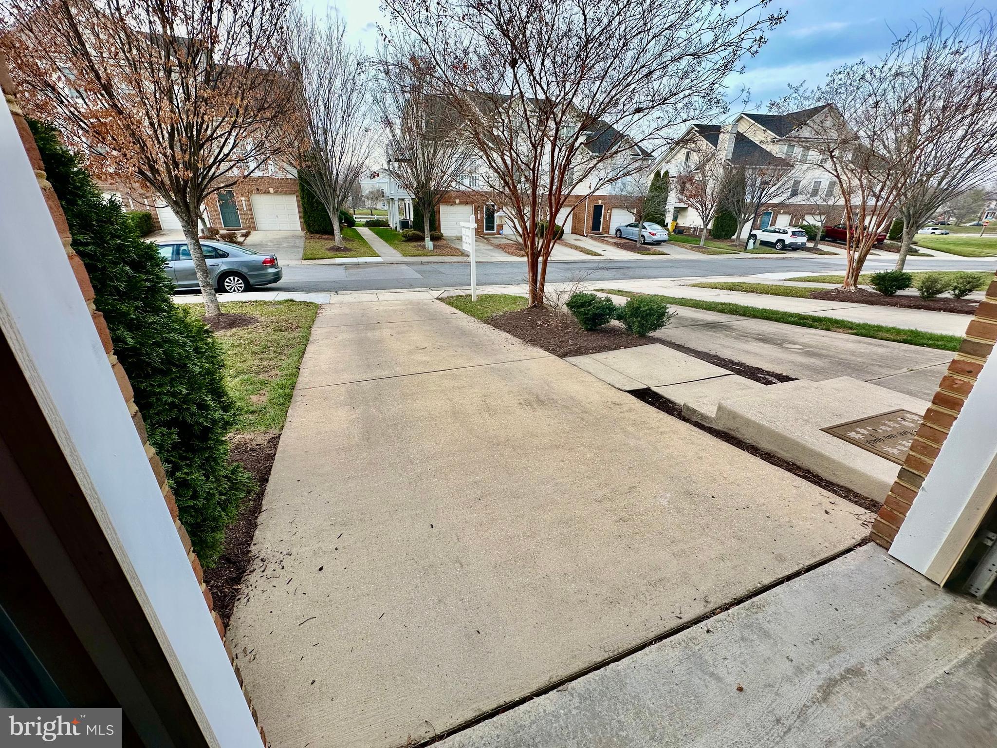2013 Astilbe Way, Unit 2013 Odenton, MD 21113 - Photo 49 of 61 a view of a yard in front of a building