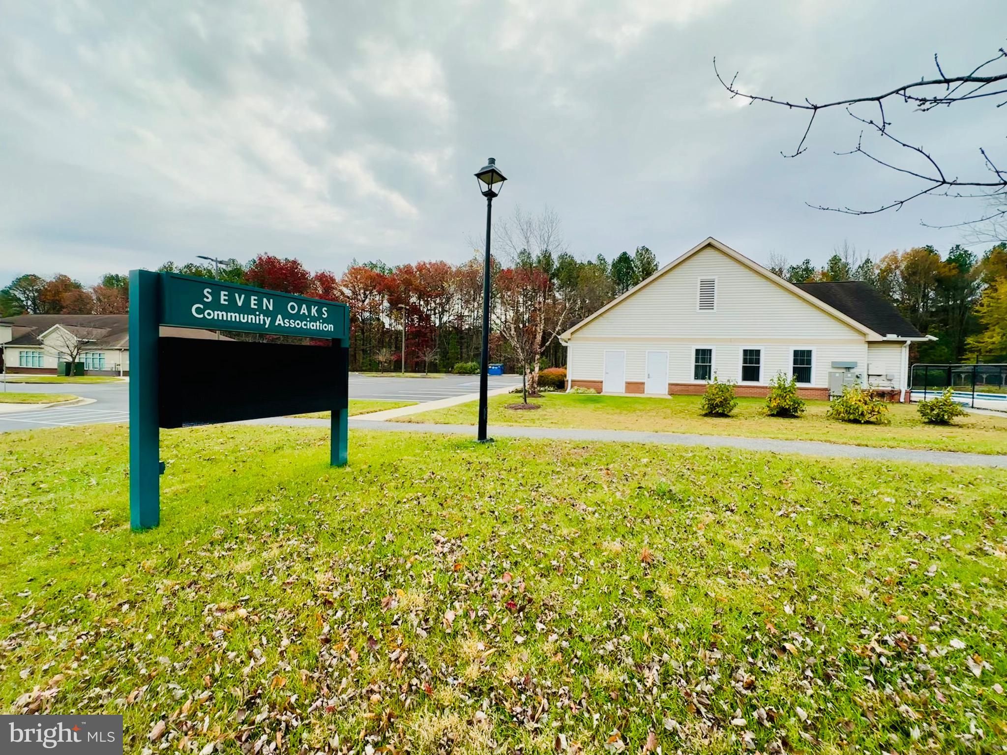 2013 Astilbe Way, Unit 2013 Odenton, MD 21113 - Photo 57 of 61 a view of a house with yard