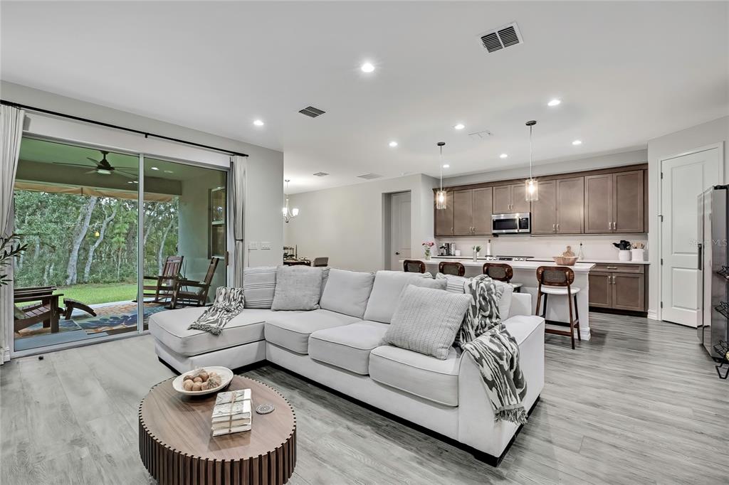 6098 North Peardale Terrace Beverly Hills, FL 34465 - Photo 11 of 59 a living room with furniture and a large window