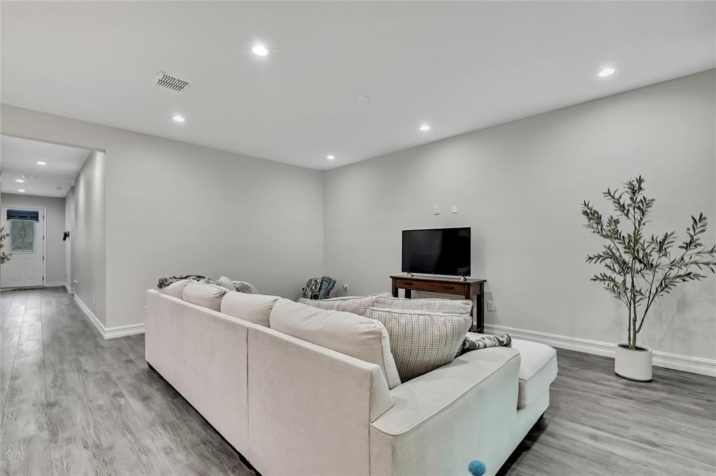 6098 North Peardale Terrace Beverly Hills, FL 34465 - Photo 14 of 59 a living room with furniture and a flat screen tv