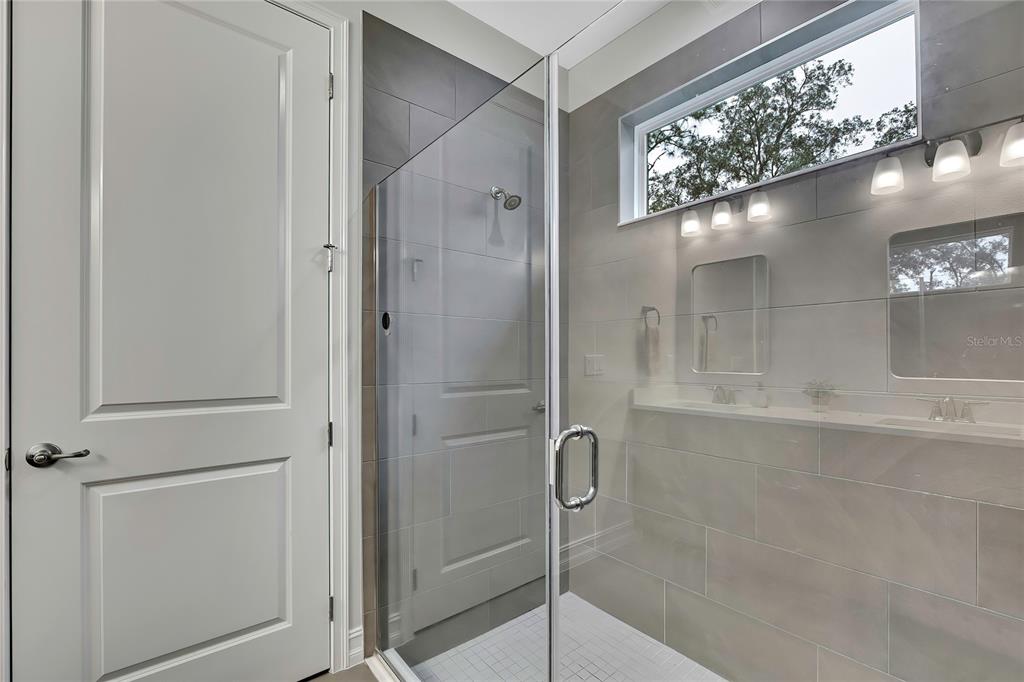6098 North Peardale Terrace Beverly Hills, FL 34465 - Photo 22 of 59 a bathroom with a glass shower door