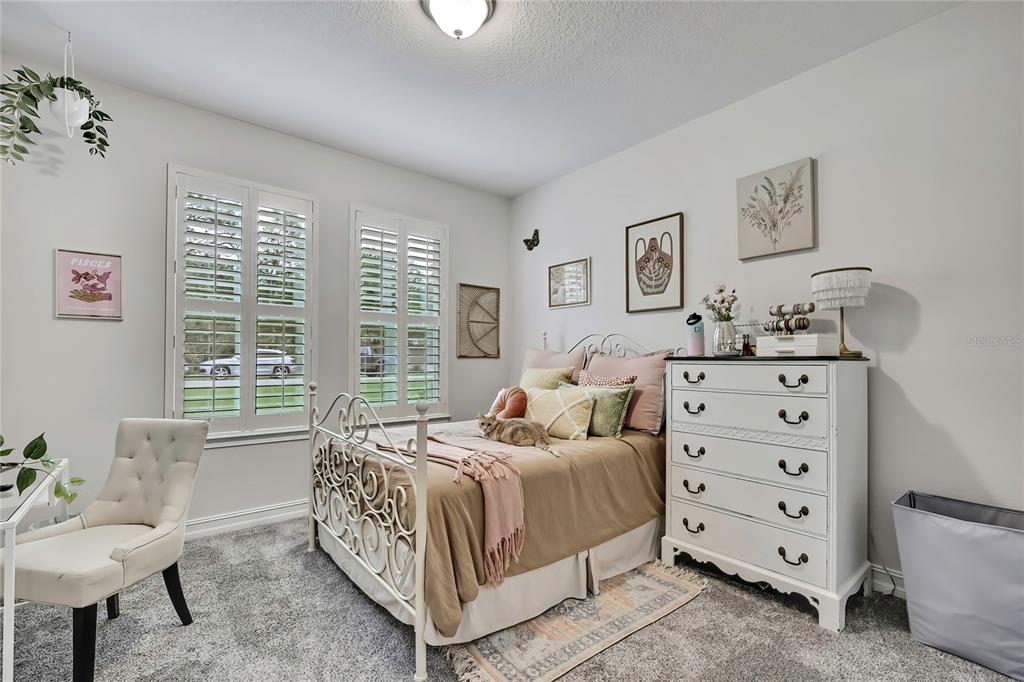 6098 North Peardale Terrace Beverly Hills, FL 34465 - Photo 25 of 59 a bedroom with a bed and a window