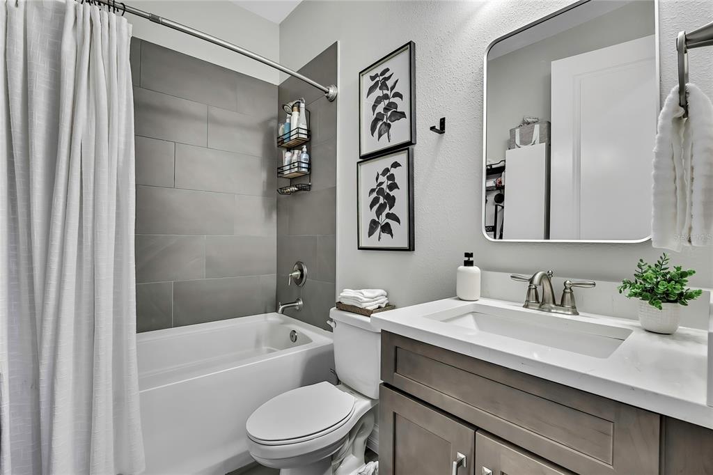 6098 North Peardale Terrace Beverly Hills, FL 34465 - Photo 27 of 59 a bathroom with a sink a toilet and shower